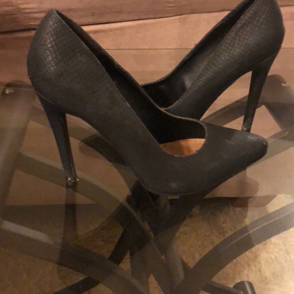 Black pointed toe heels